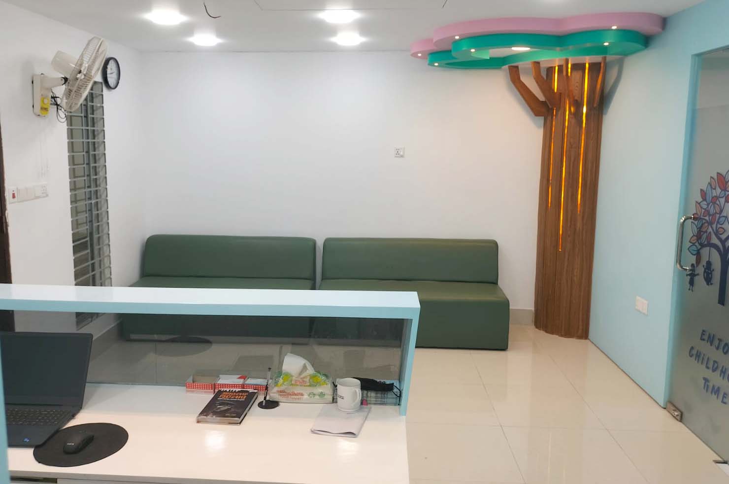Waiting lounge with seating and front desk